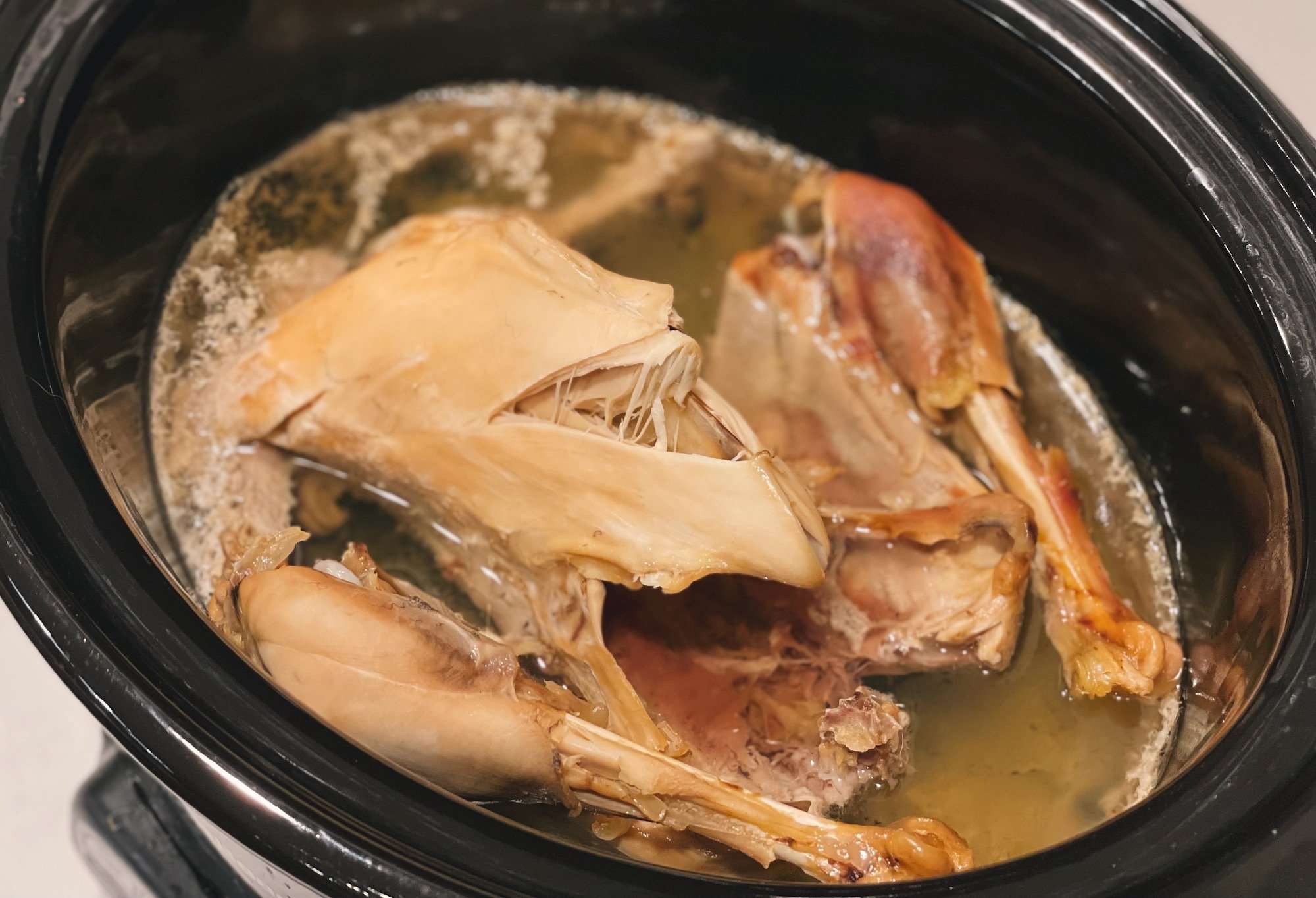 Whole young chicken cooked in crockpot