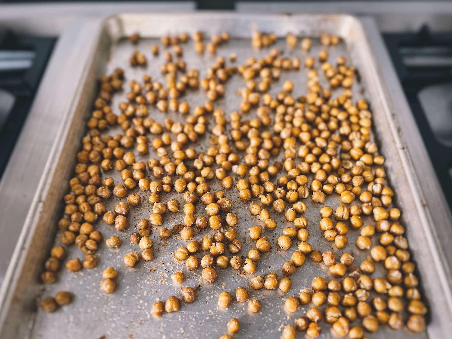 Roasted chickpeas on a sheet pan