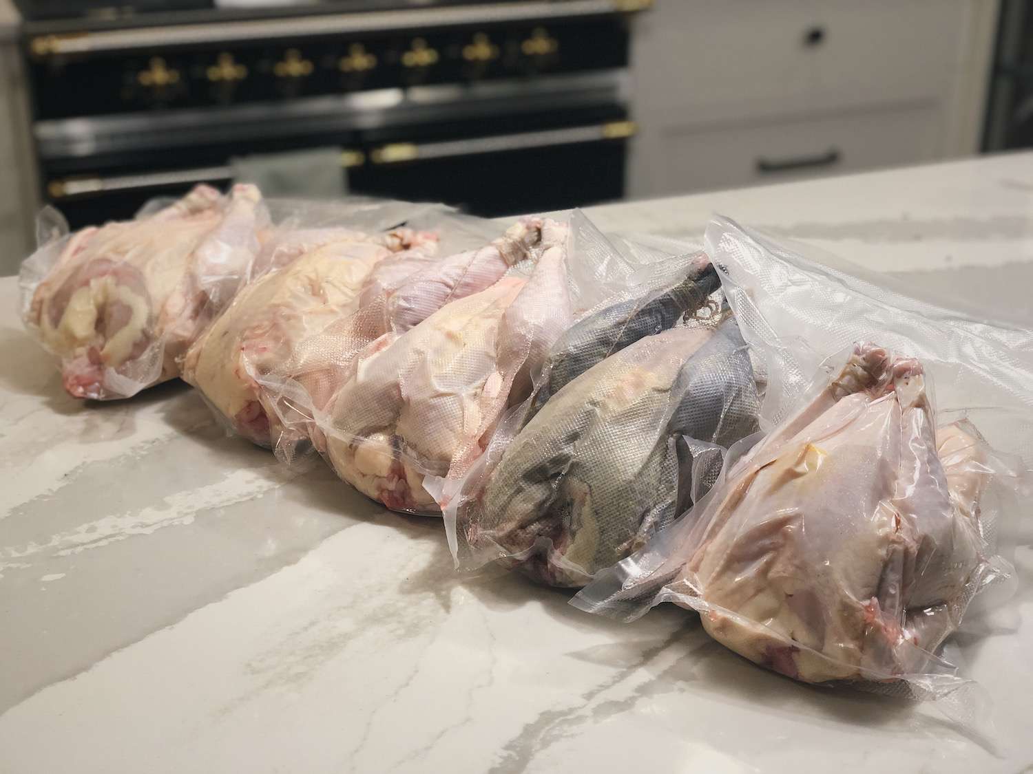 Vacuum sealed rudd ranger meat chickens, but one of them has black skin