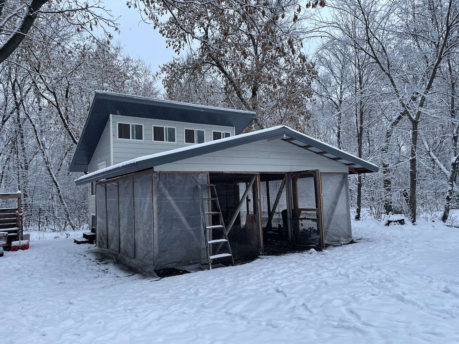 A photo of my chicken coop in the winter with snow