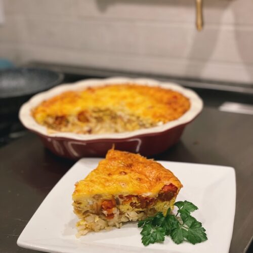 A vertical photo showing the finished quiche recipe