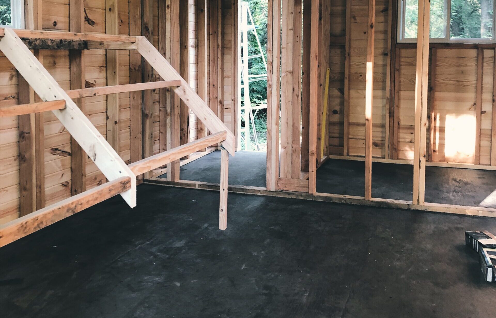 a photo of the inside of a chicken coop with linoleum flooring